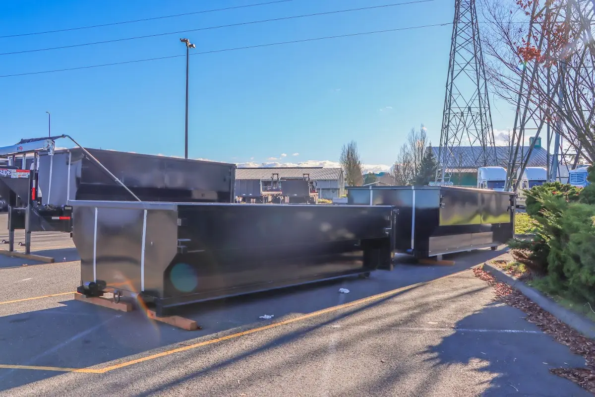 Roll-off dumpster ready for waste disposal at job site for Estate Cleanout Dumpster Rental in River Park